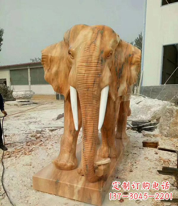 辽宁鼻卷如意晚霞红招财大象石雕