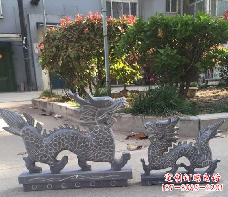 辽宁青石雕刻母子龙是由中领雕塑工厂家生产的一…
