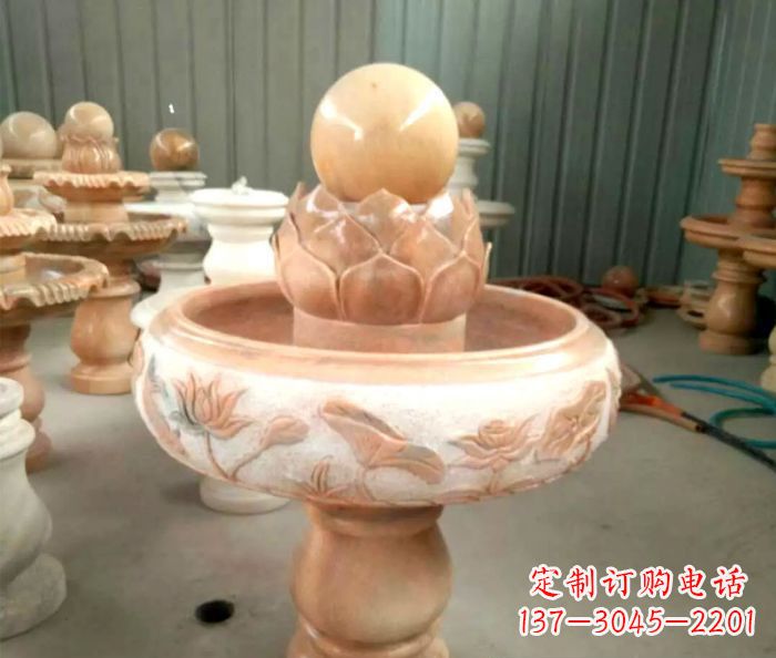 辽宁石来运转晚霞红风水球喷泉石雕