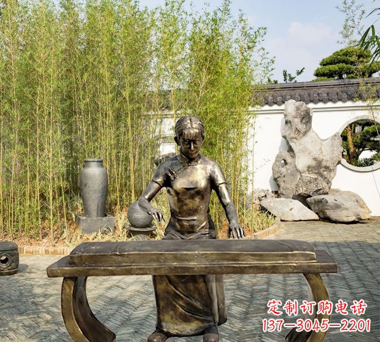 辽宁铜雕弹古筝人物
