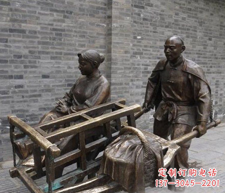 辽宁推独轮车的人物铜雕
