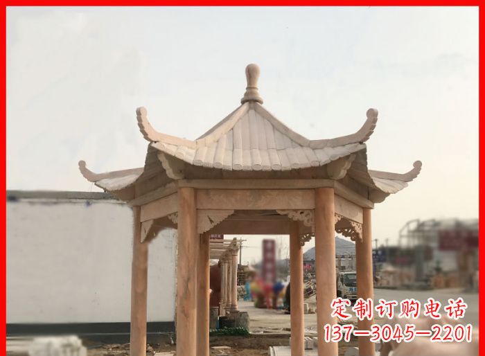 辽宁晚霞红公园六角石雕凉亭