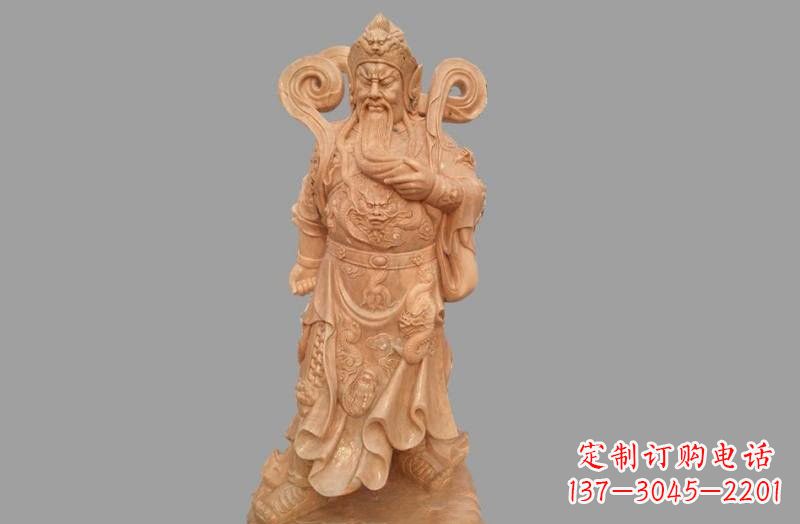辽宁晚霞红武财神关公雕像