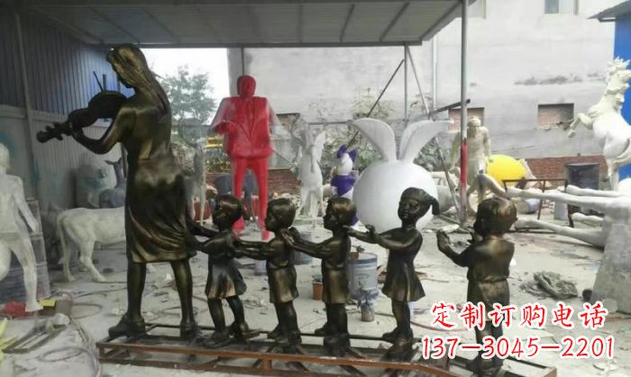 辽宁校园老师和儿童铜雕
