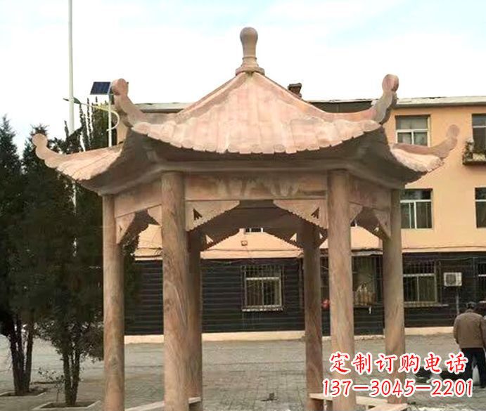 辽宁园林晚霞红六角石雕凉亭