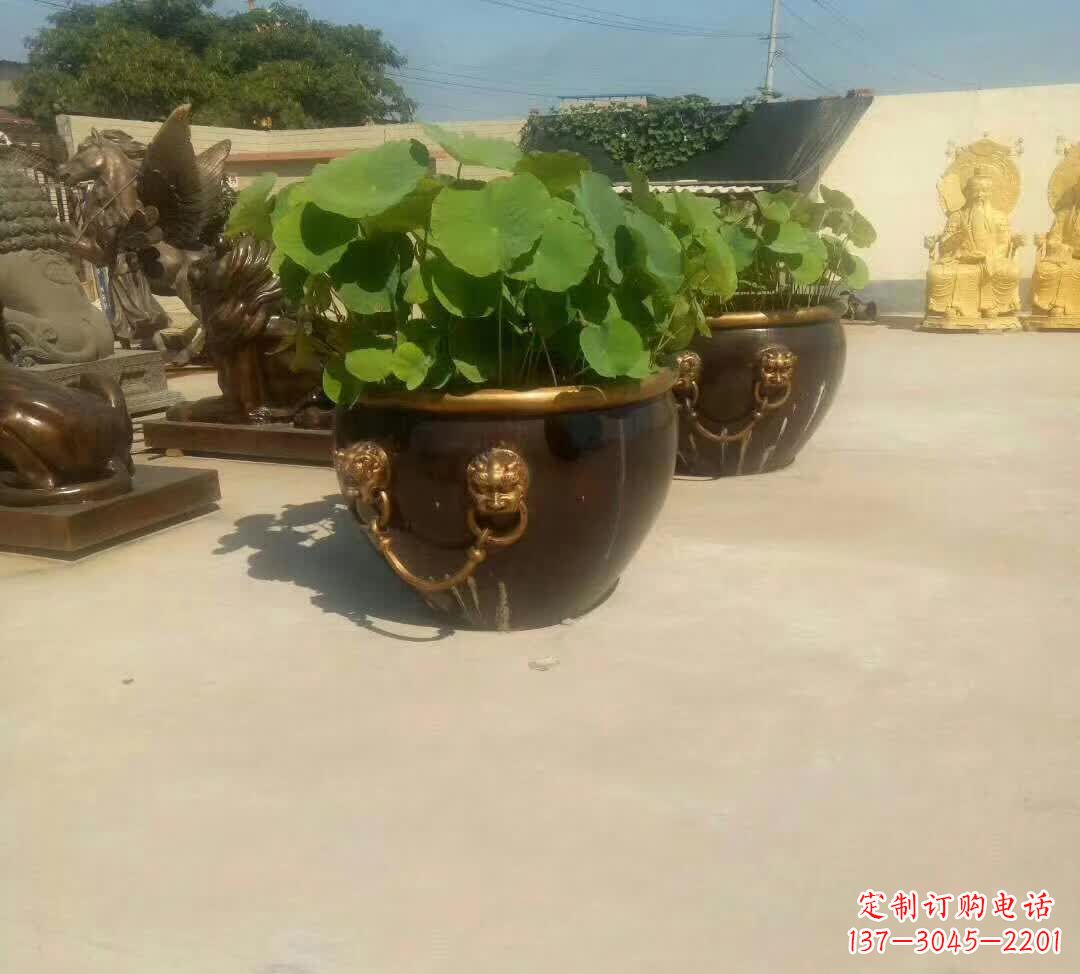 辽宁铸铜狮子头水缸雕塑